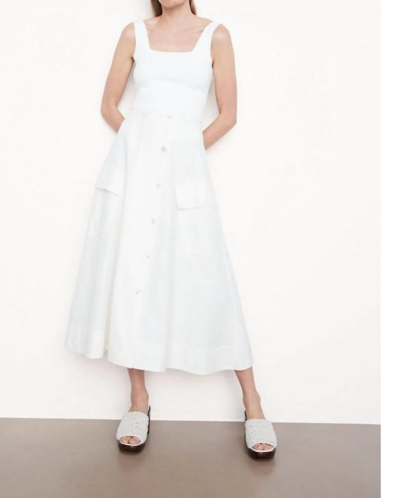 Front of a model wearing a size 10 Utility Button Front Midi Skirt In White in White by Vince. | dia_product_style_image_id:356799